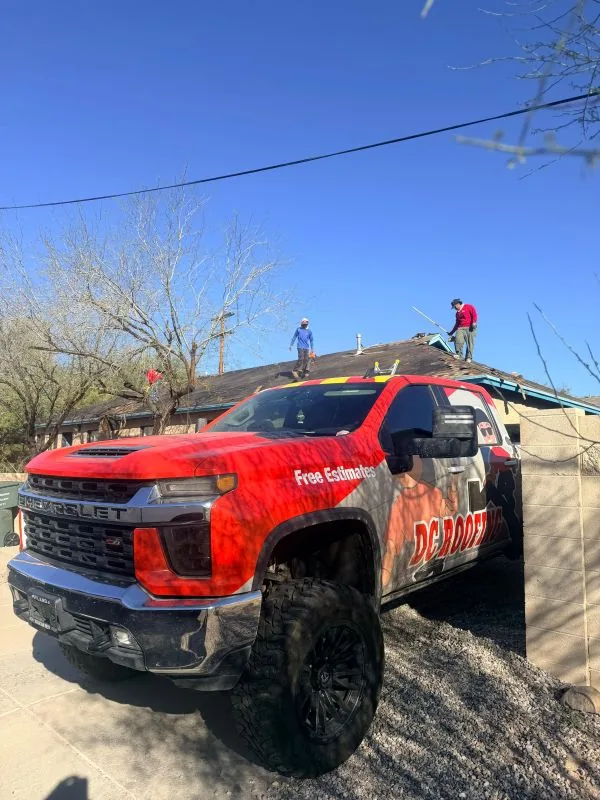DC Roofing truck responding to an emergency roofing call in Tucson